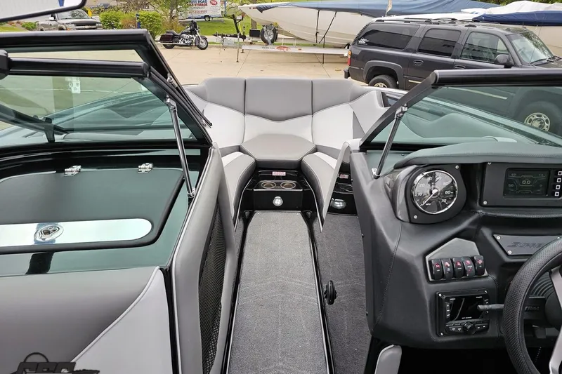 Slide: The Image of 2018 Supreme S226 boat interior with modern dashboard and seating. - 68