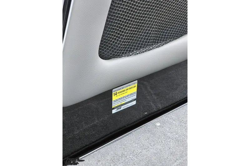 Slide: The Image of 2018 Supreme S226 interior with capacity label, netted storage, and carpeted flooring. - 69