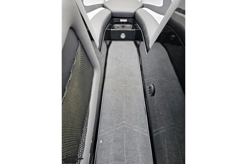 Slide: The Image of Interior of a 2018 Supreme S226 boat, featuring seating and storage compartments. - 70