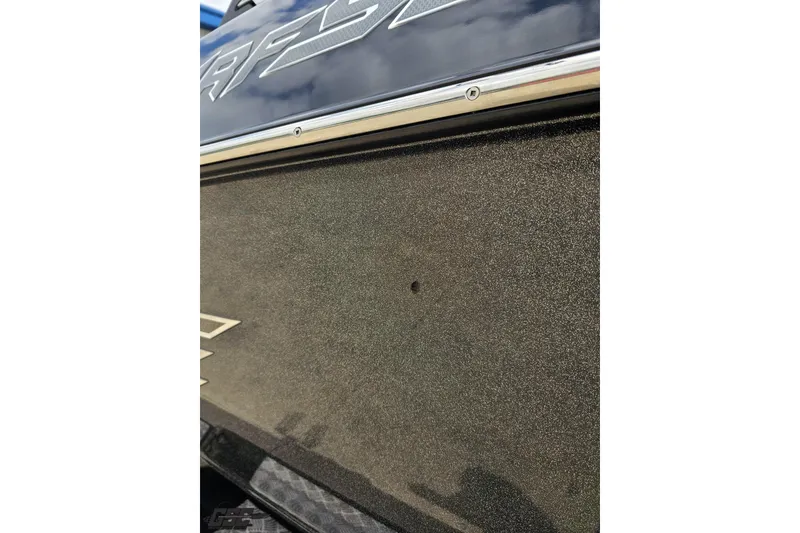 Slide: The Image of Close-up of 2018 Supreme S226 boat hull with metallic finish and logo detail. - 8