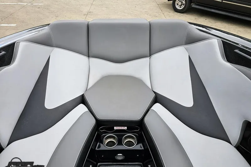Slide: The Image of 2018 Supreme S226 boat interior with gray and white cushioned seating. - 81
