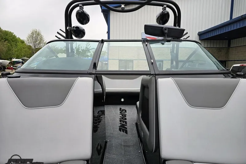 Slide: The Image of 2018 Supreme S226 boat interior with gray seating and black accents. - 83