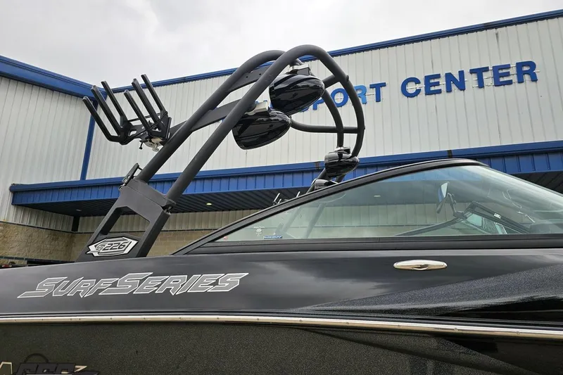 Slide: The Image of 2018 Supreme S226 Surf Series boat at a sport center. - 9