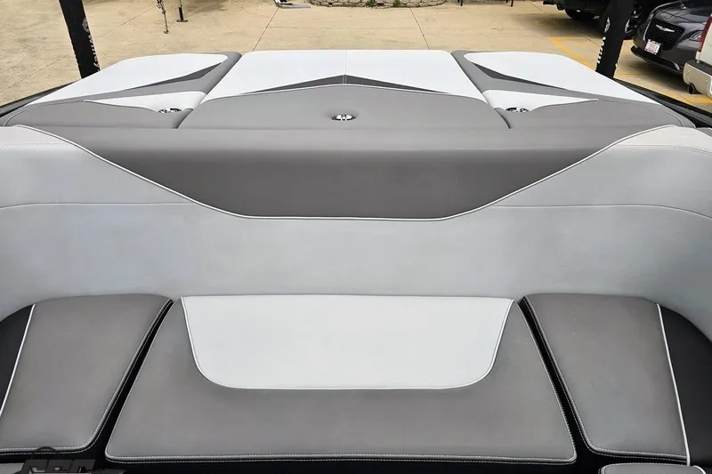 Slide: The Image of 2018 Supreme S226 boat interior with sleek gray and white upholstery design. - 91