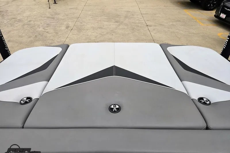 Slide: The Image of 2018 Supreme S226 boat deck with sleek gray and white upholstery design. - 93