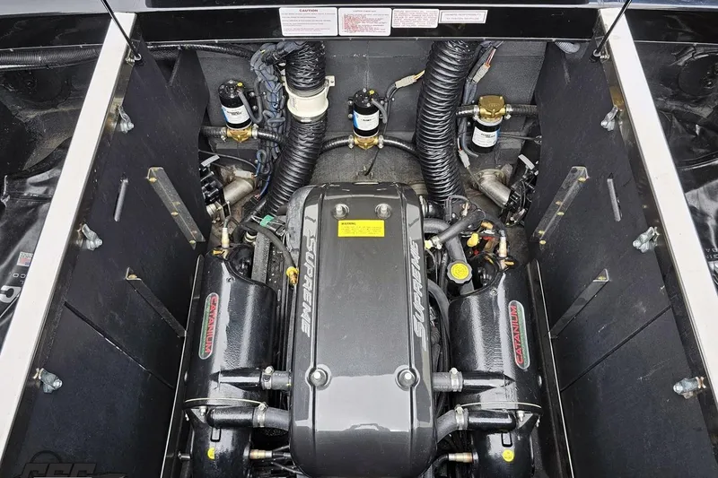 Slide: The Image of Engine compartment of a 2018 Supreme S226 boat, showcasing detailed mechanical components. - 96