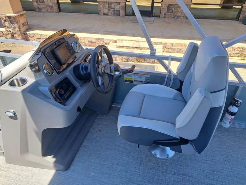 Slide: The Image of Interior of Avalon Venture 85 Quad Fish 2026 with helm console. - 15