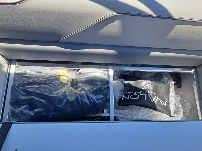 Slide: The Image of Storage compartment in Avalon Venture 85 Quad Fish 2026 boat. - 19