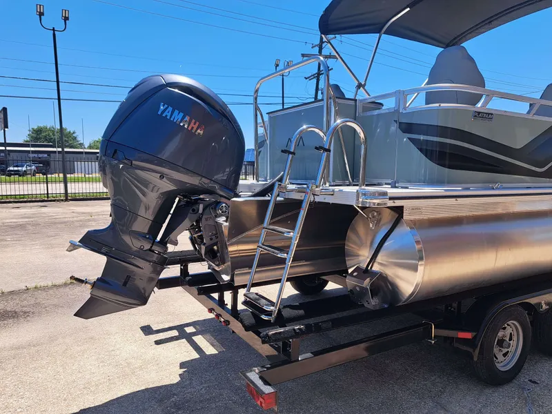 Slide: The Image of Avalon Venture 85 Quad Fish 2026 with Yamaha motor on trailer. - 7