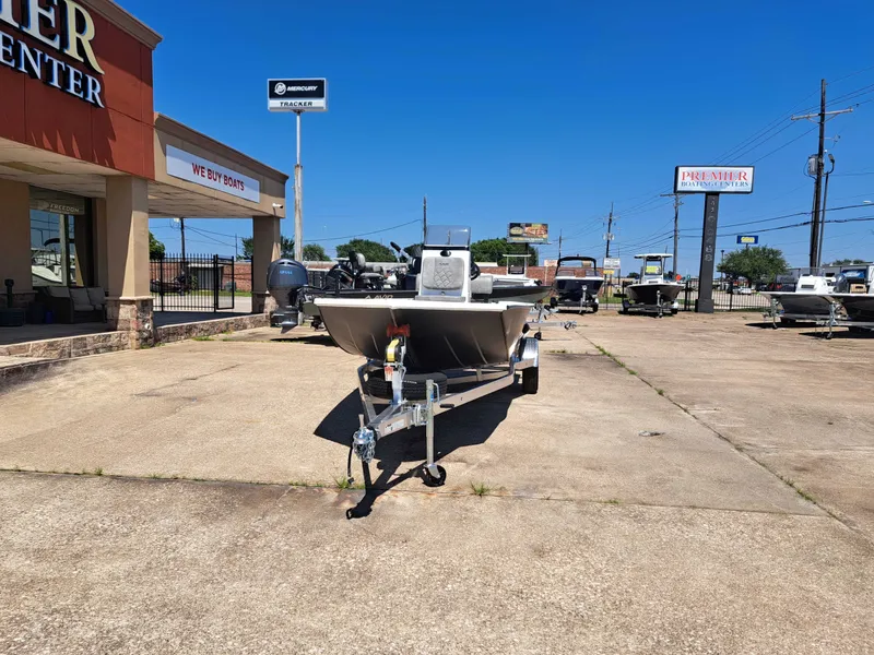 Slide: The Image of Avid 18CC ROGUE 2026 boat on trailer at Premier Boating Center. - 3