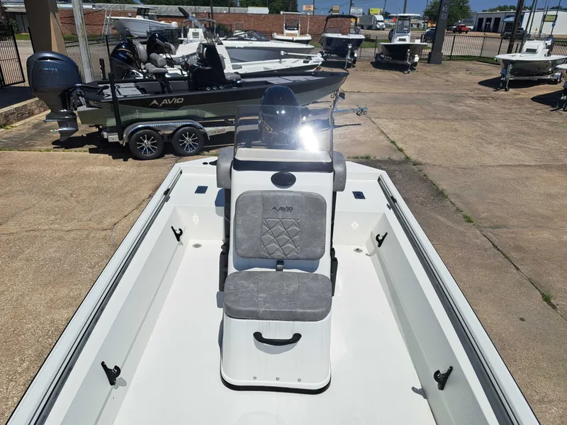 Slide: The Image of Avid 18CC ROGUE 2026 boat on a parking lot. - 11