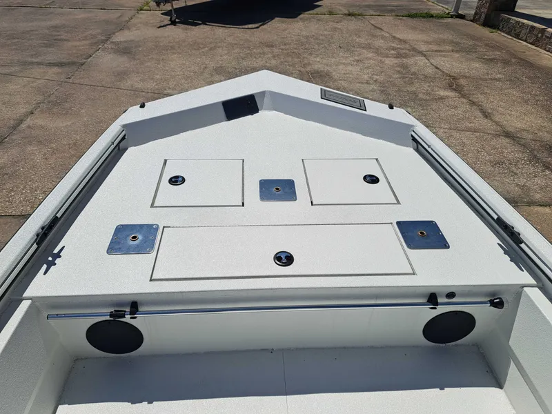 Slide: The Image of Avid 18CC ROGUE 2026 boat deck with storage hatches. - 8