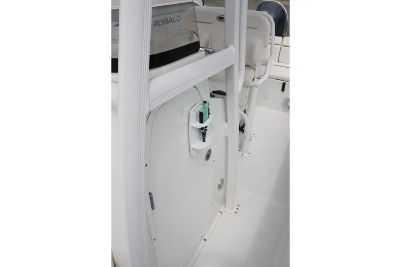 Slide: The Image of 2022 Sea Hunt Ultra 219 boat interior, featuring sleek white design and modern amenities. - 26