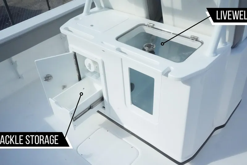 Slide: The Image of 2026 Blazer Bay Makaira 2800 boat featuring livewell and tackle storage compartments. - 12