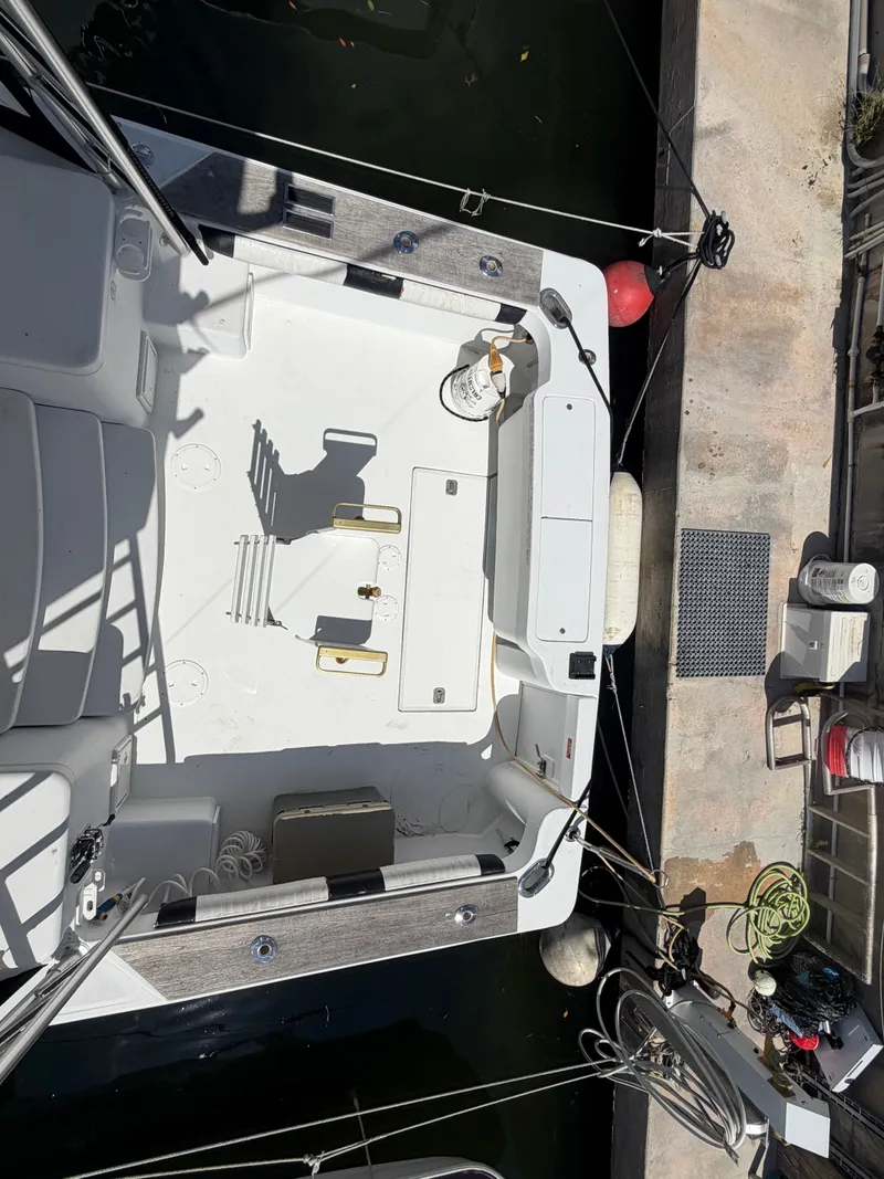 Slide: The Image of Aerial view of a 1998 Luhrs Open boat at dock. - 6