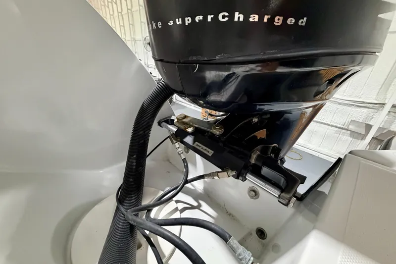 Slide: The Image of 2006 Glacier Bay 2640SX Renegade boat engine detail with supercharged motor components. - 14