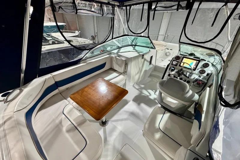 Slide: The Image of Interior of 2006 Glacier Bay 2640SX Renegade boat with seating and navigation controls. - 20