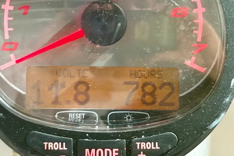 Slide: The Image of Close-up of a 2006 Glacier Bay 2640SX Renegade gauge showing 11.8 volts and 782 hours. - 23