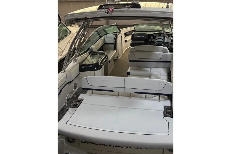 Slide: The Image of 2016 Formula 350 Crossover Bowrider interior with sleek seating and modern dashboard. - 13