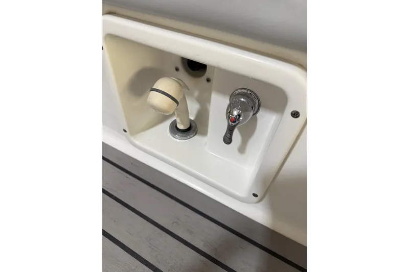 Slide: The Image of 2016 Formula 350 Crossover Bowrider shower controls on deck. - 26