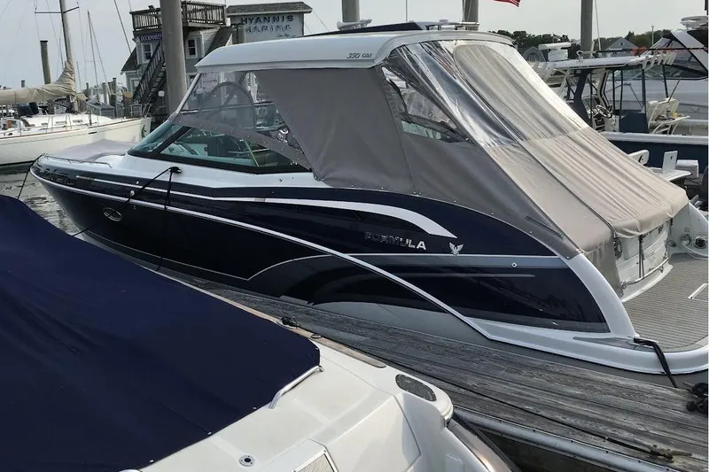Slide: The Image of 2016 Formula 350 Crossover Bowrider docked at marina. - 4