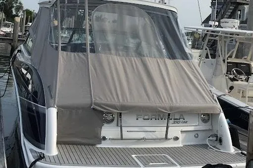 Slide: The Image of 2016 Formula 350 Crossover Bowrider docked with cover. - 5