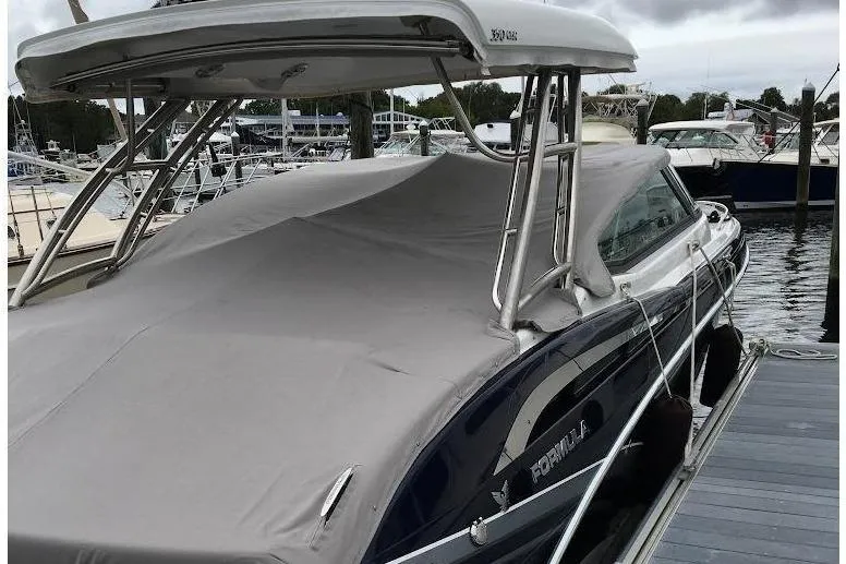 Slide: The Image of 2016 Formula 350 Crossover Bowrider docked with cover. - 6
