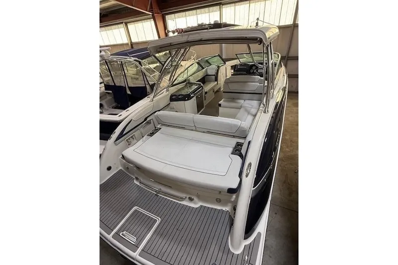 Slide: The Image of 2016 Formula 350 Crossover Bowrider inside a storage facility. - 8