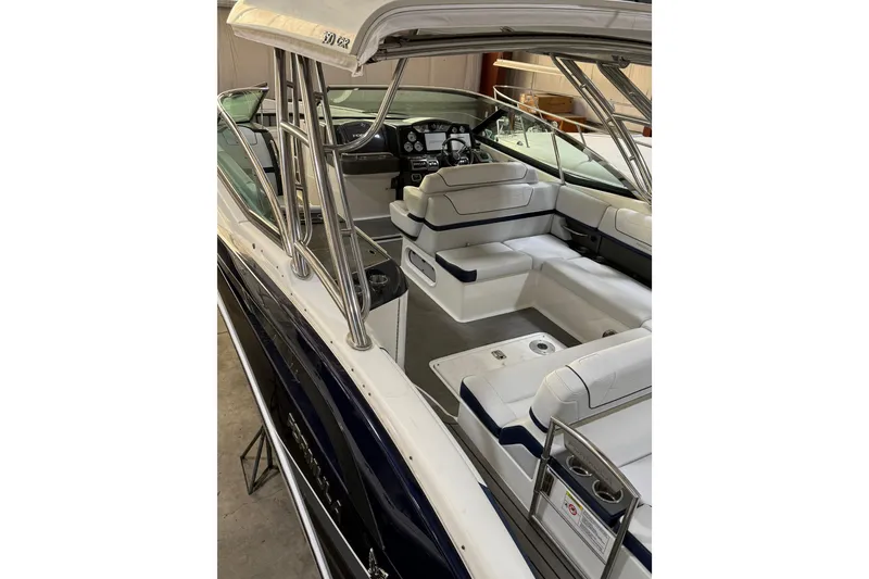 Slide: The Image of 2016 Formula 350 Crossover Bowrider interior with seating and helm, showcasing luxury design. - 9