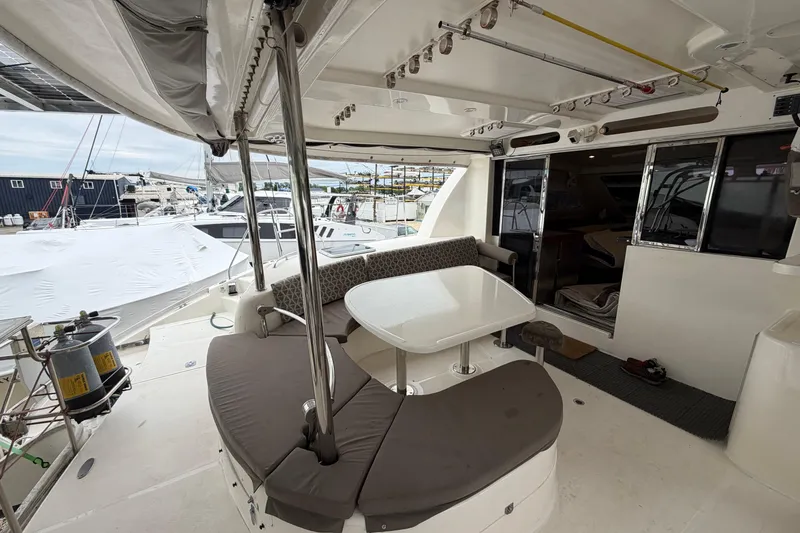 Slide: The Image of Spacious deck of a 2007 Leopard 46 yacht with seating and table. - 27
