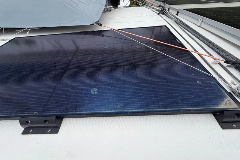 Slide: The Image of Solar panel on a 2007 Leopard 46 yacht deck, with visible mounting brackets. - 42