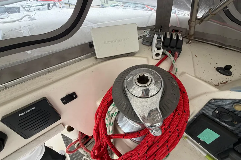 Slide: The Image of Leopard 46 sailboat cockpit with winch, ropes, and navigation equipment, 2007 model. - 47