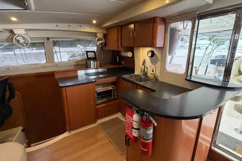 Slide: The Image of Luxurious kitchen interior of a 2007 Leopard 46 yacht with modern amenities. - 7