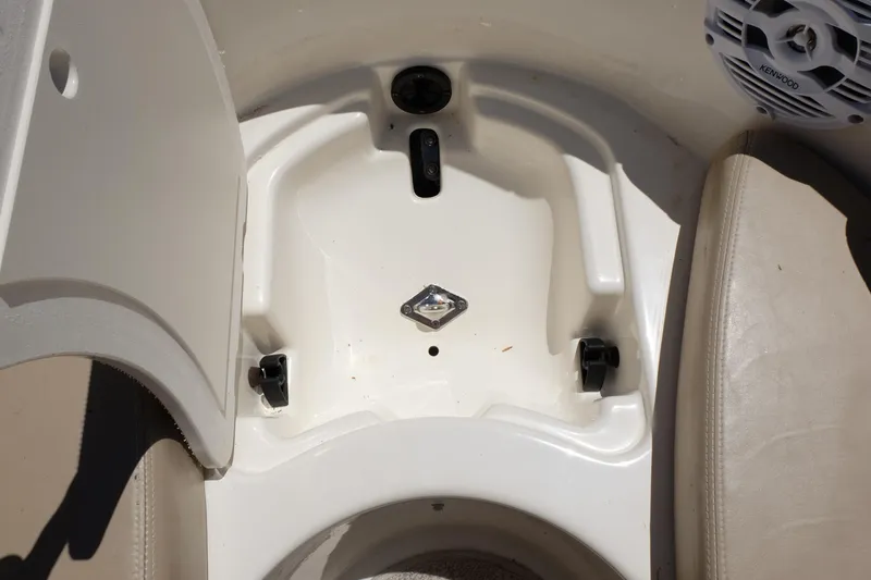 Slide: The Image of 2006 Glastron GXL 205 boat interior with speaker and storage compartment. - 9