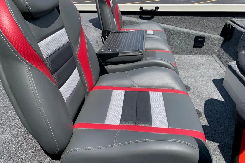 Slide: The Image of 2026 Ranger RT188P boat interior with gray and red seats, featuring modern design. - 10