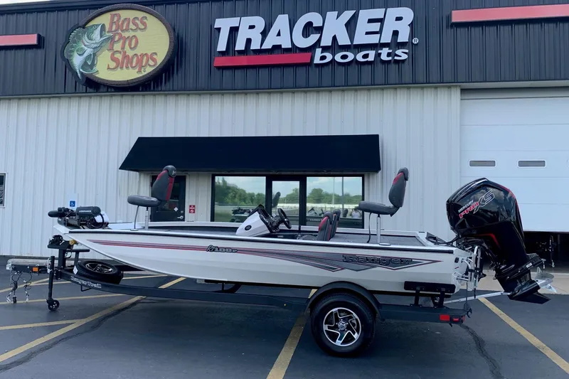 The Image of 2026 Ranger RT188P boat displayed outside Bass Pro Shops Tracker Boats store. - 0