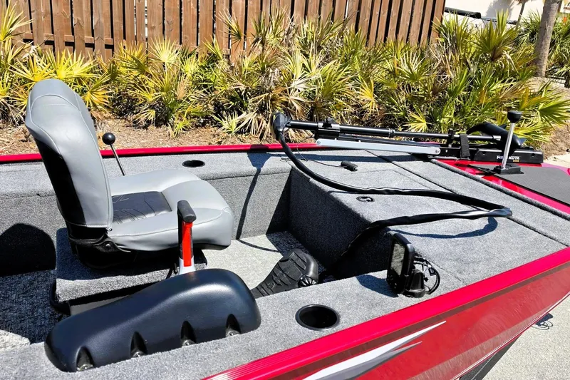 Slide: The Image of 2026 Tracker Panfish 17 boat interior with seating and fishing equipment. - 9