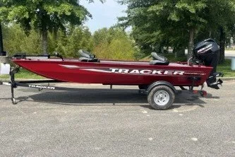 The Image of 2026 Tracker Panfish 17 boat on trailer, parked outdoors. - 0