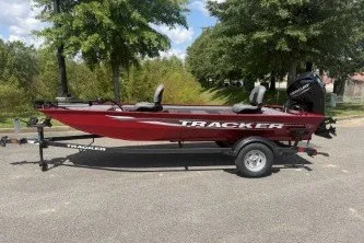 The Image of 2026 Tracker Panfish 17 boat on trailer, parked outdoors. - 0