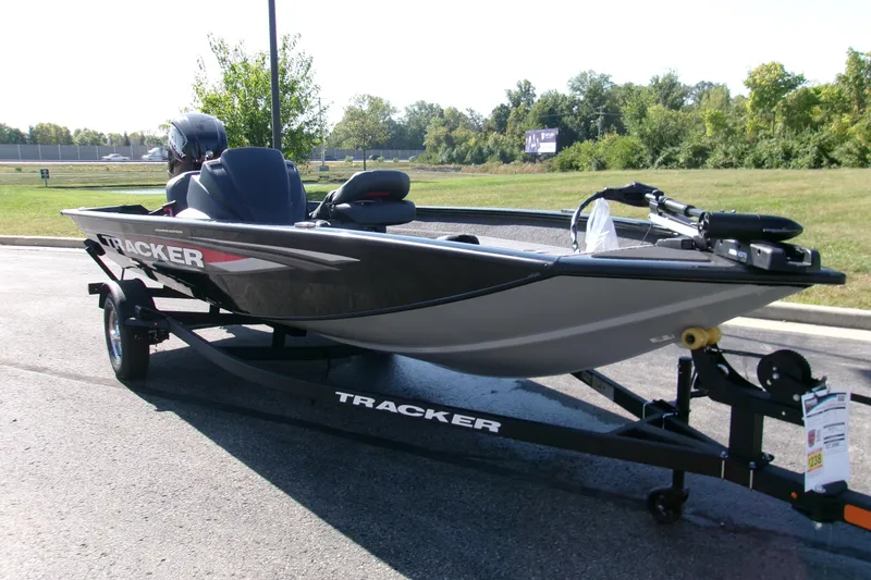 The Image of 2026 Tracker Pro Team 175 Crappie Edition boat on trailer, parked outdoors. - 0
