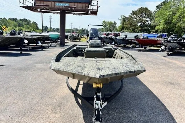 Slide: The Image of 2026 Tracker Grizzly 1860 CC boat on trailer in outdoor showroom. - 14