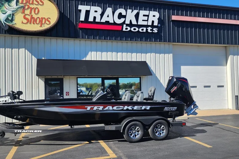 The Image of 2026 Tracker Savage 215 boat on trailer outside Bass Pro Shops. - 0