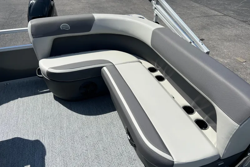 Slide: The Image of 2026 Sun Tracker Bass Buggy 16 XL Select boat seating with cup holders. - 4