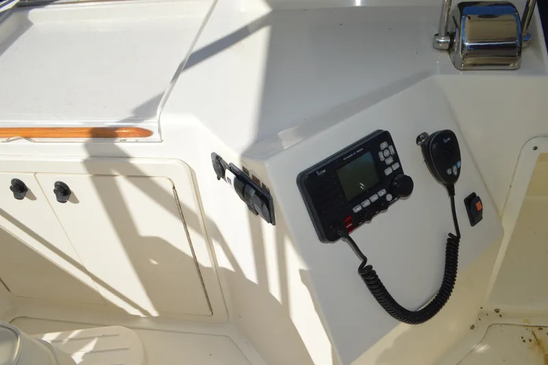 Slide: The Image of Control panel of a 2004 Sabre 36 boat with radio and microphone. - 20
