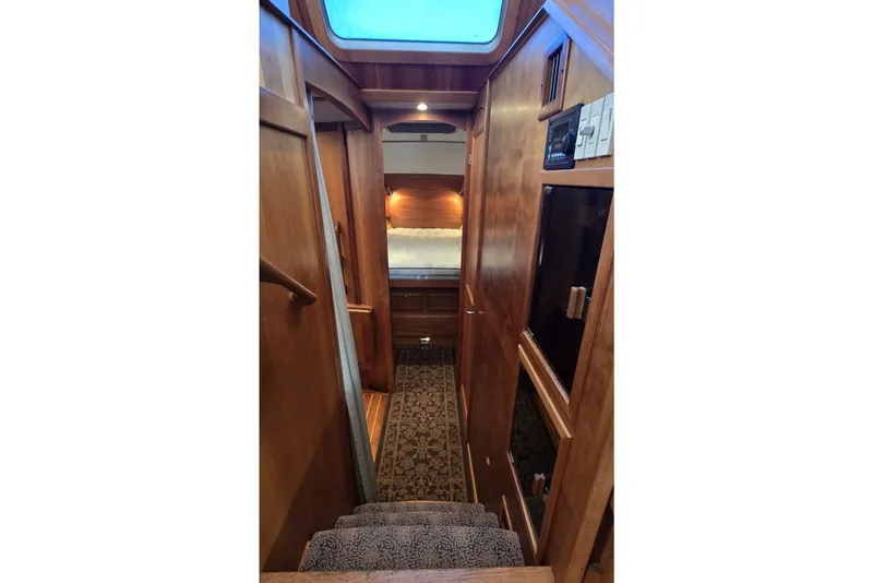 Slide: The Image of Interior of 2004 Sabre 36 yacht with wooden finish and cozy cabin view. - 38