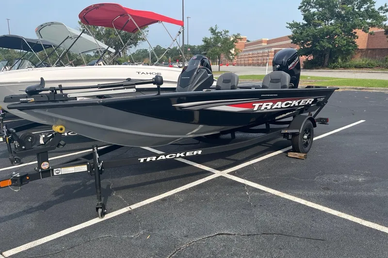 The Image of 2026 Tracker Pro Team 175 Crappie Edition boat in parking lot, side view. - 0