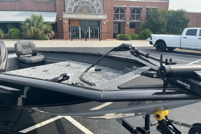 Slide: The Image of 2026 Tracker Pro Team 175 Crappie Edition boat parked near Savannah Mall entrance. - 6