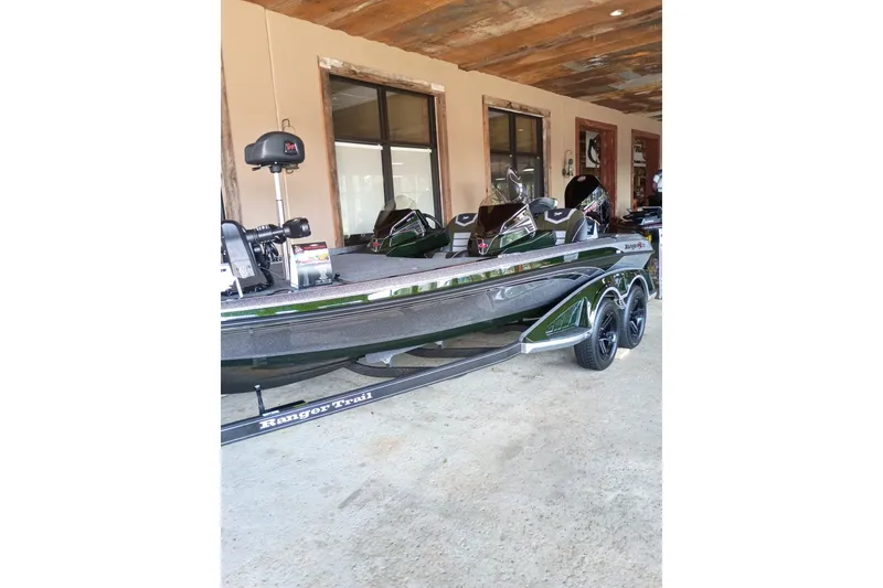 The Image of 2026 Ranger Z520 boat in a garage, featuring sleek design and dual consoles. - 0