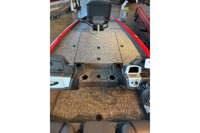 Slide: The Image of 2026 Tracker Pro Team 195 boat interior with seating and storage compartments. - 7