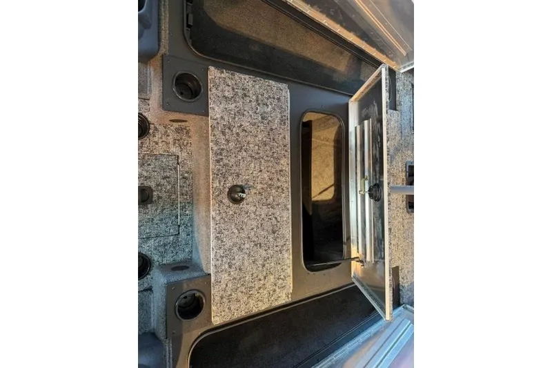 Slide: The Image of Interior storage compartments of a 2026 Tracker Pro Team 195 boat. - 10